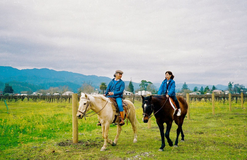 Tony & Lisa Peju, riding horses, rutherford